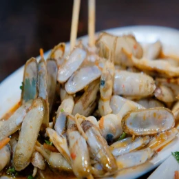 Công thức và cách làm món ốc móng tay xào bơ tỏi