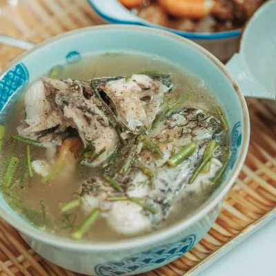 Công thức và cách làm món canh cá lóc nấu măng chua