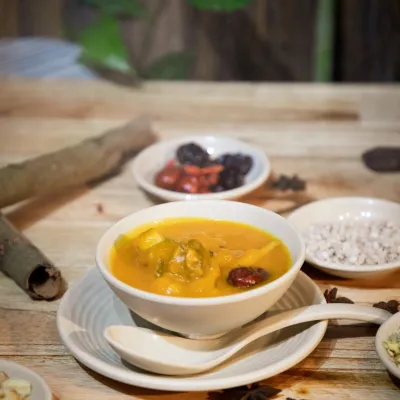 Canh bí đỏ gà viên
